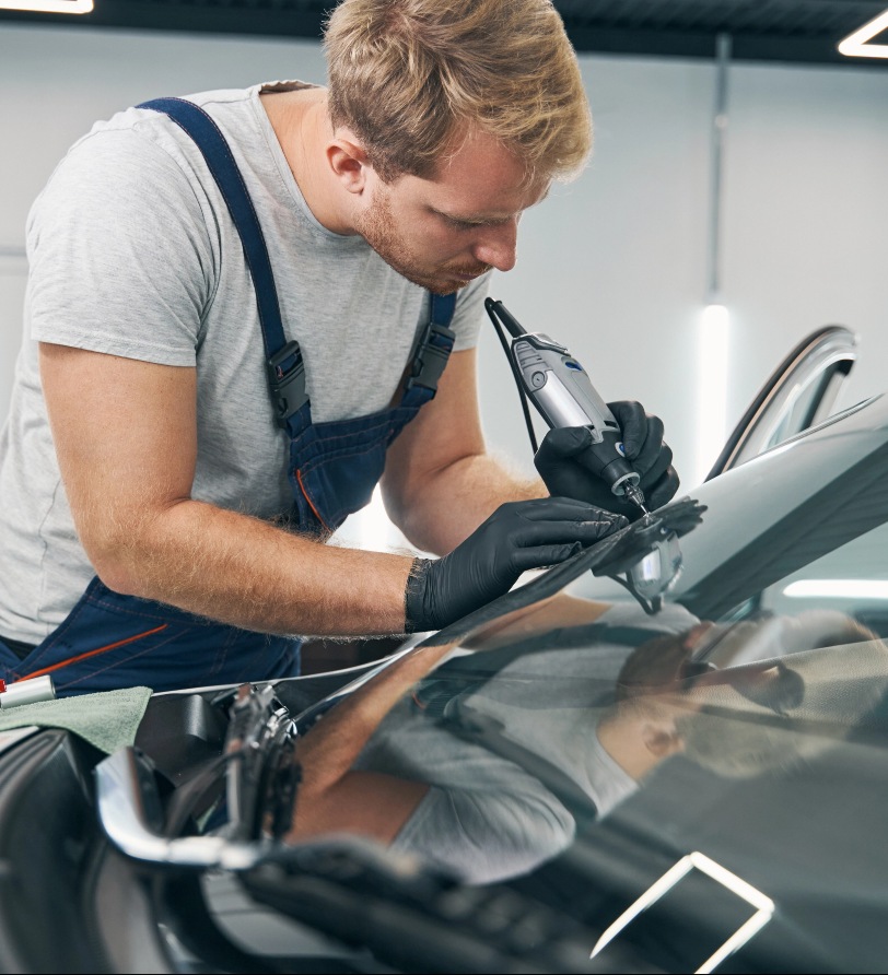 Man repairing vehicle