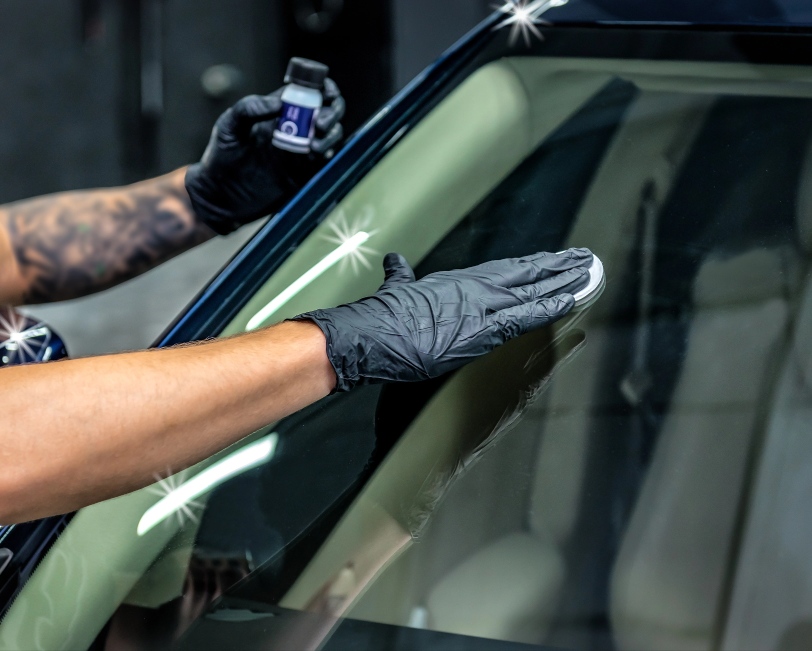 Man repairing windshield