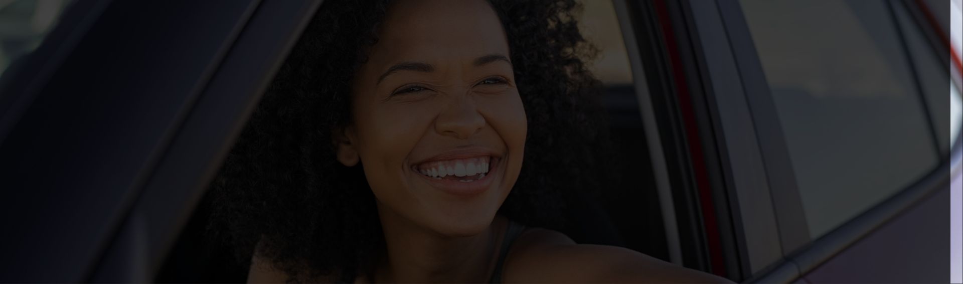 Woman smiling in a sunny day scaled