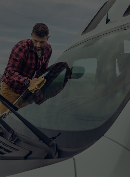 Man changing windshield