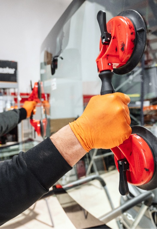 Man Working for Car Mobile Windshield Replacement